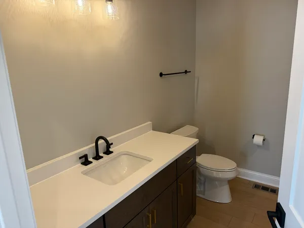a bathroom with a sink and a toilet