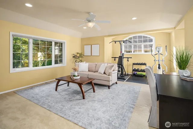 a living room with furniture and a window