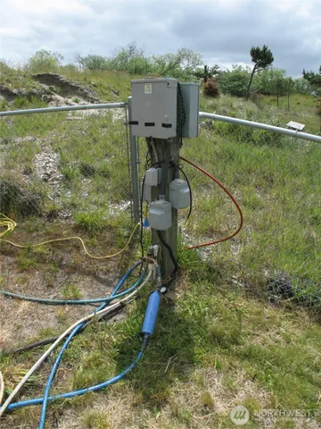 a view of a wooden floor with a table chairs