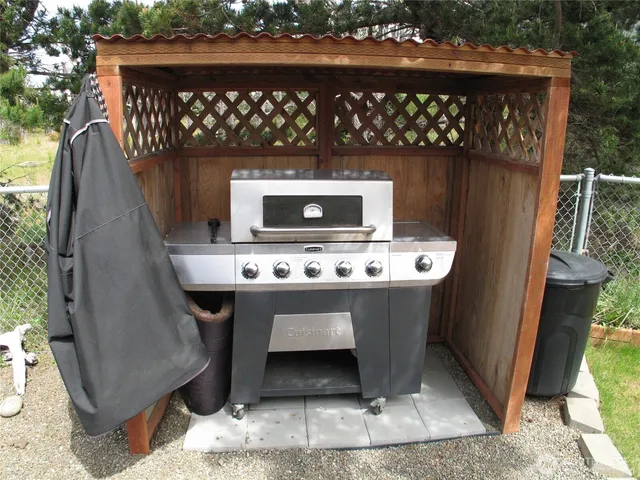 a view of yard from deck having patio