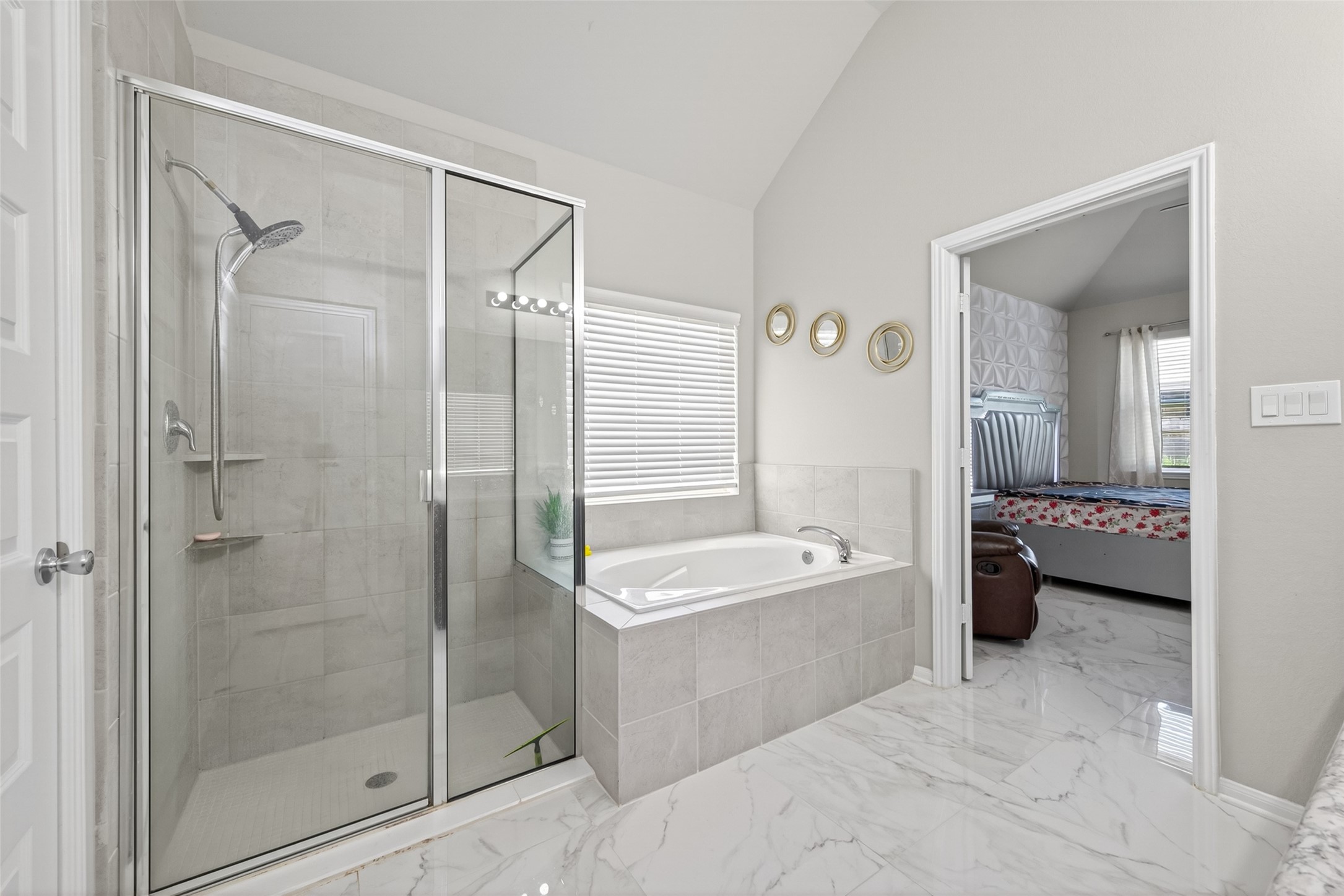 22409 Kinley Street New Caney, TX 77357 - Photo 30 of 46 a bathroom with a tub sink shower and mirror