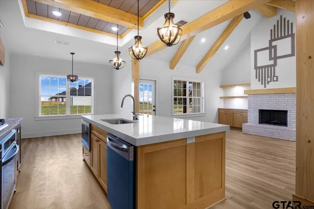 a room with a bench and wooden floor