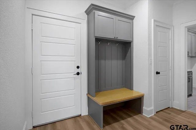a utility room with cabinets