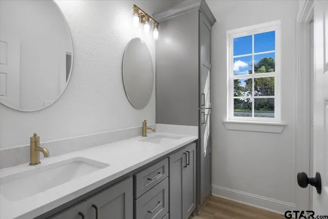 a white toilet sitting next to a bath tub