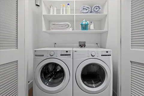 a utility room with dryer and washer