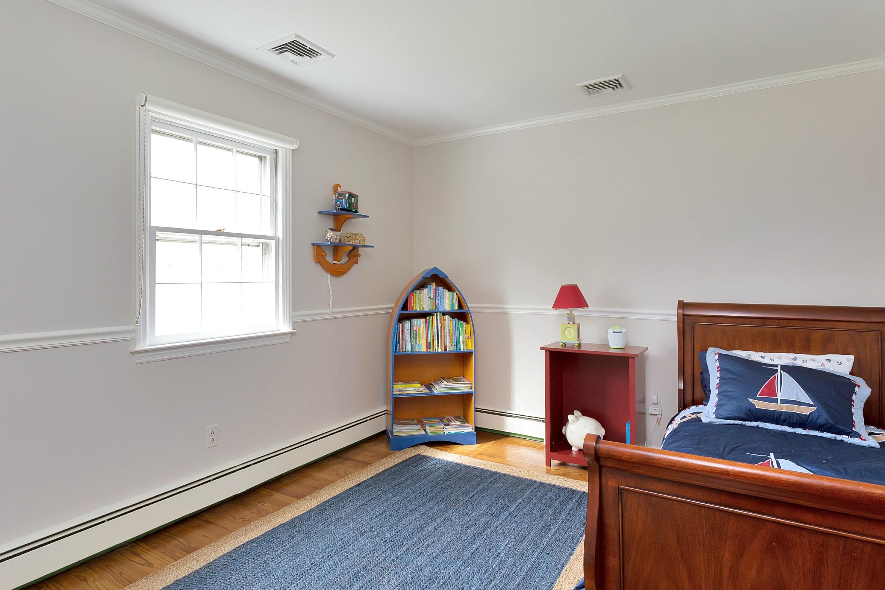 483 Middlesex Road Darien, CT 06820 - Photo 18 of 27 a living room with furniture and a window