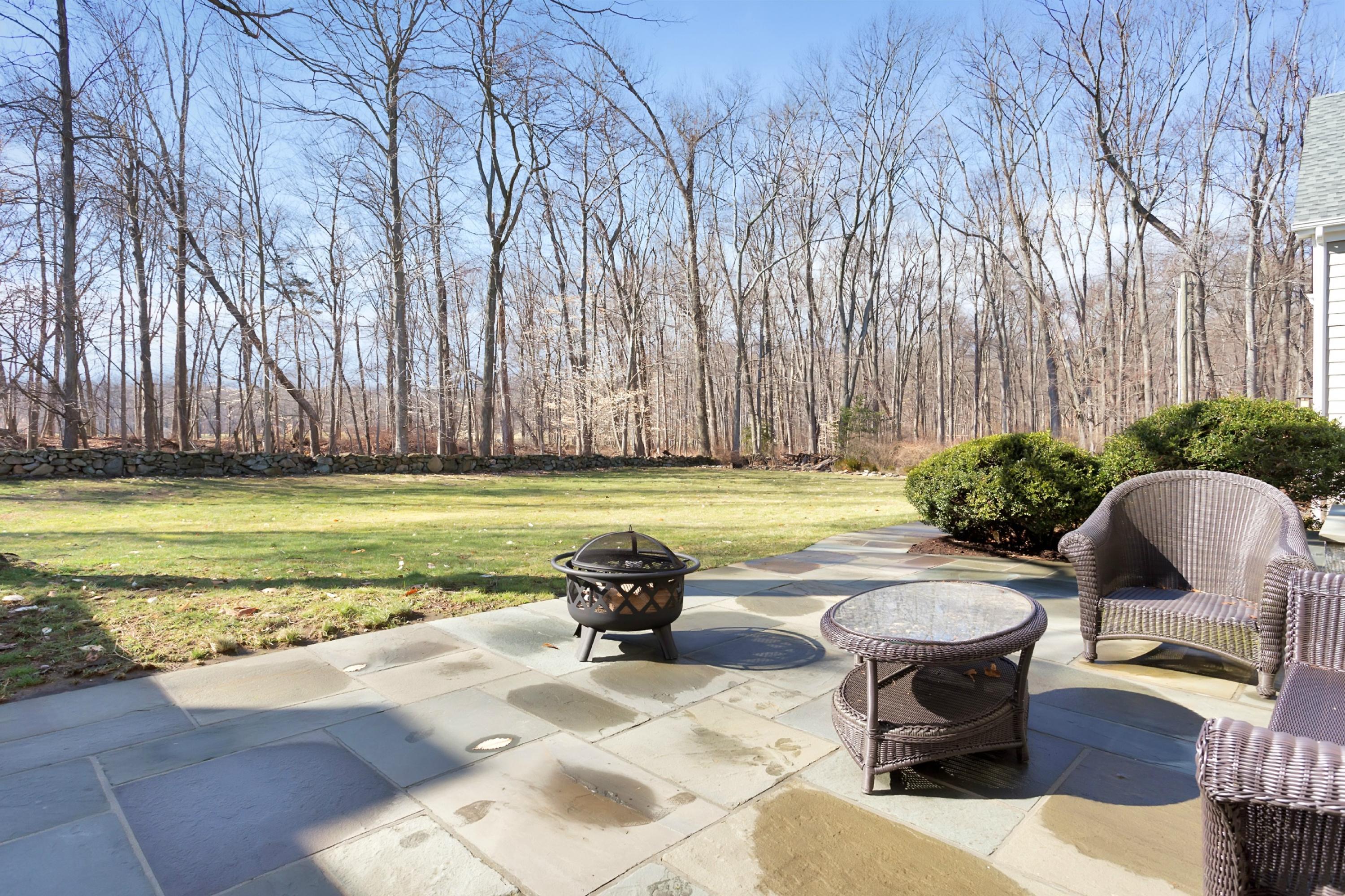483 Middlesex Road Darien, CT 06820 - Photo 25 of 27 a view of swimming pool with outdoor seating and plants