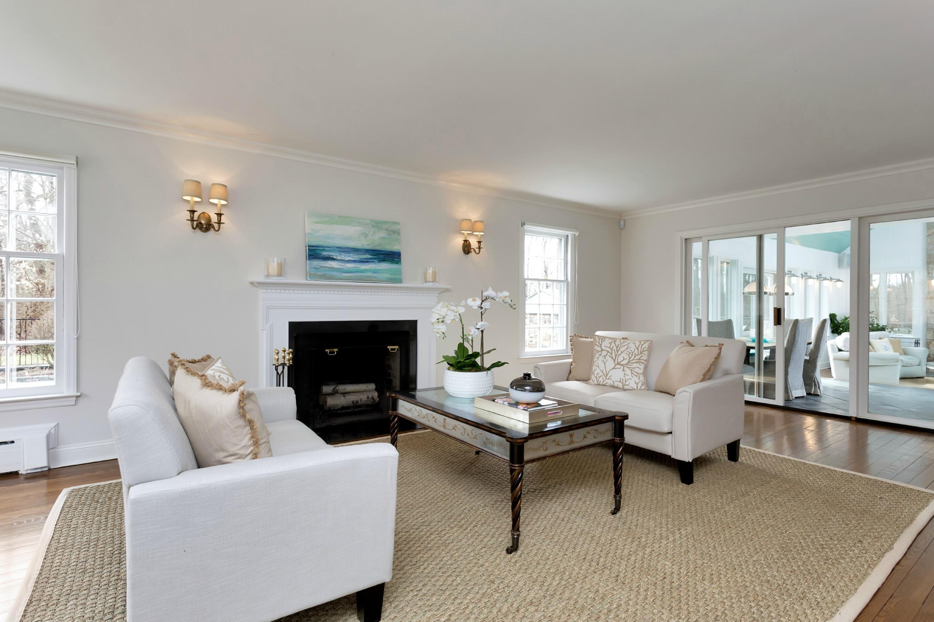 483 Middlesex Road Darien, CT 06820 - Photo 3 of 27 a living room with furniture and a fireplace
