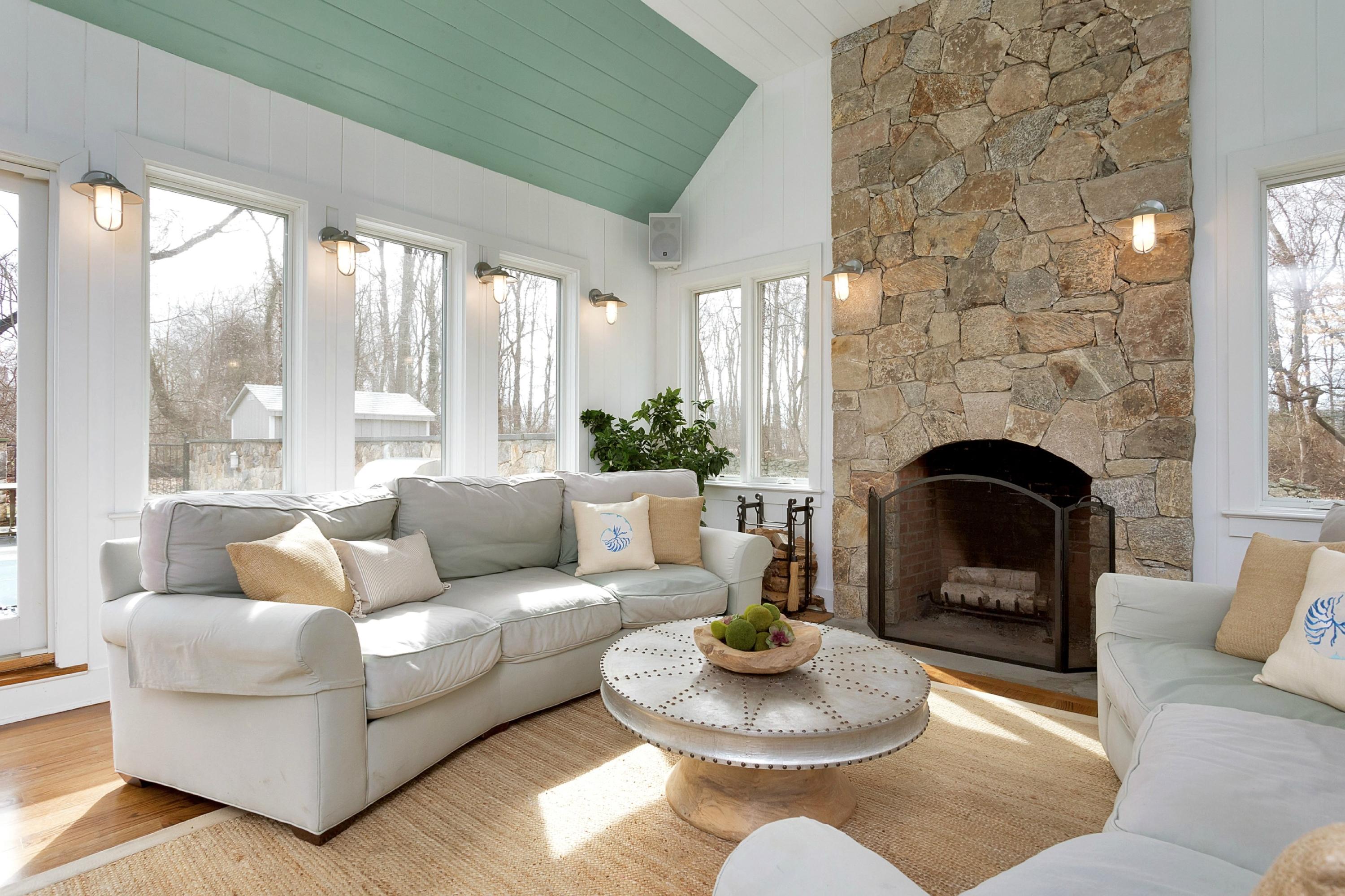 483 Middlesex Road Darien, CT 06820 - Photo 5 of 27 a living room with furniture and a fireplace