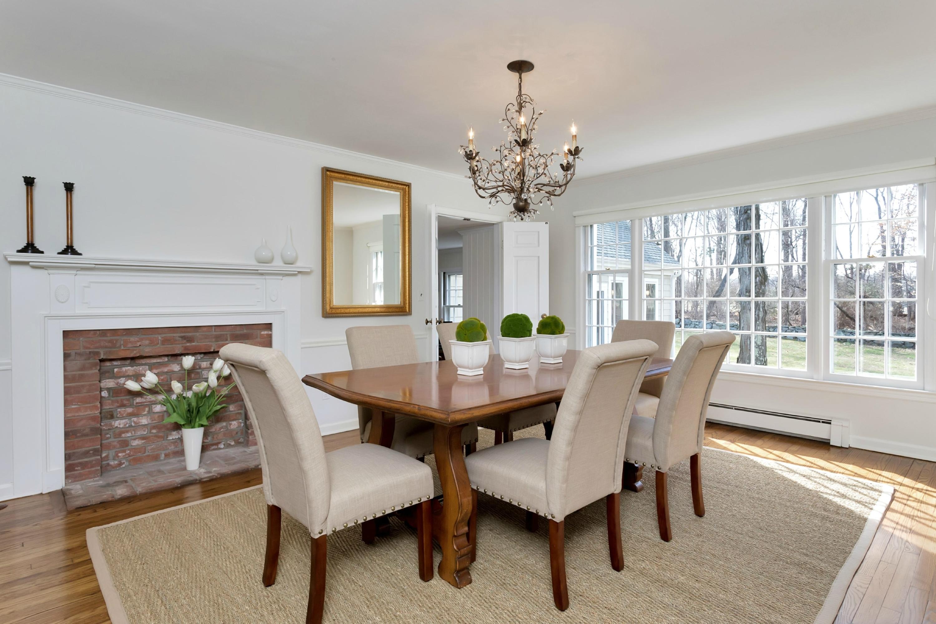483 Middlesex Road Darien, CT 06820 - Photo 7 of 27 a view of a dining room with furniture window and wooden floor