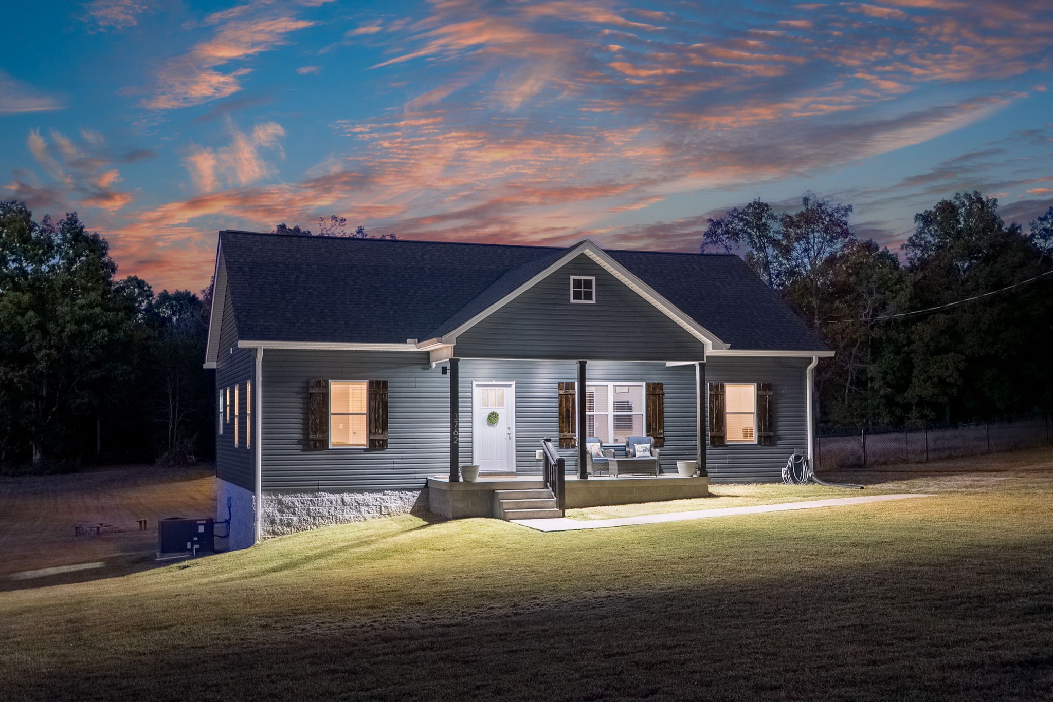 3762 Bowker Road Charlotte, TN 37036 - Photo 2 of 35 a front view of a house with a yard