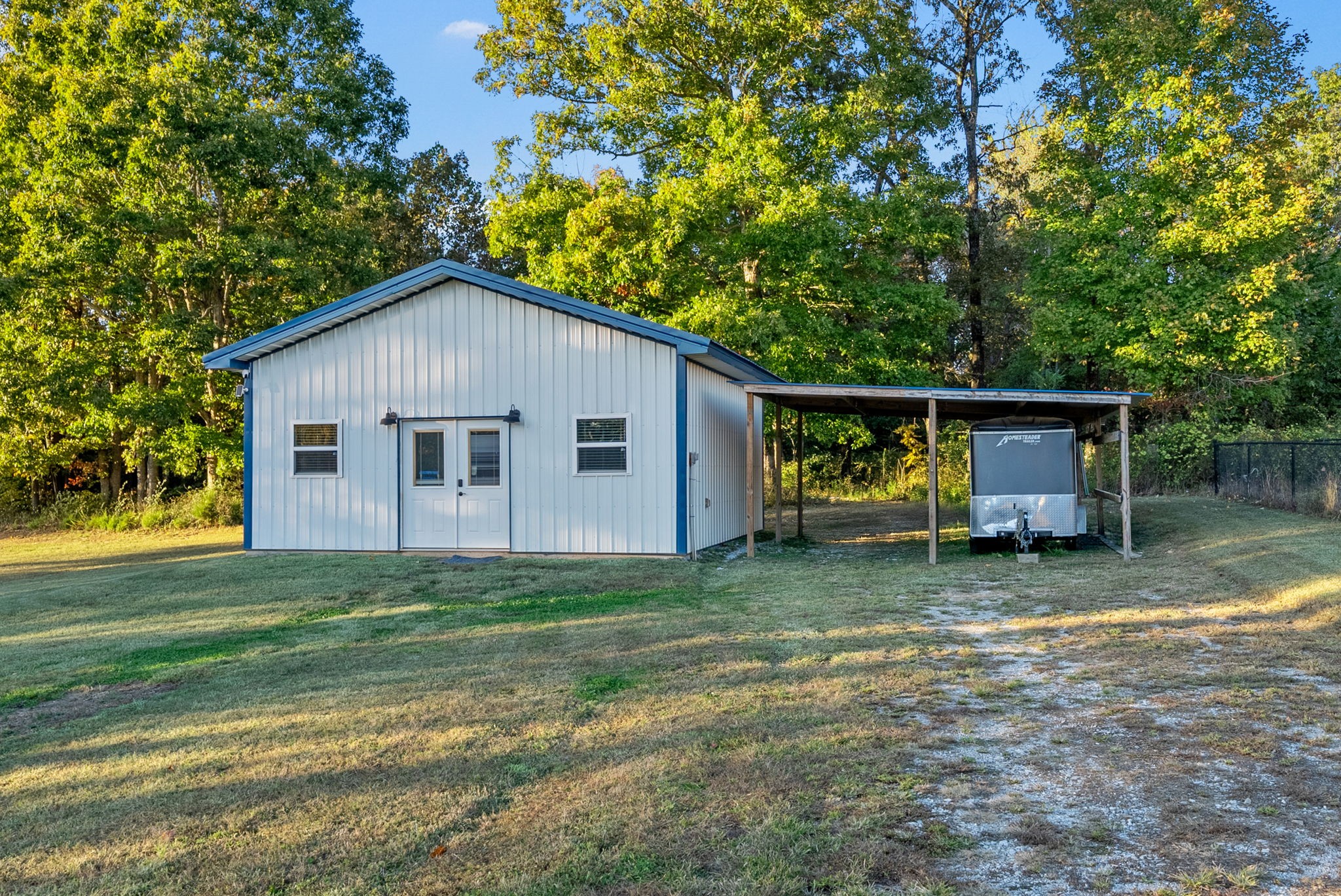 3762 Bowker Road Charlotte, TN 37036 - Photo 24 of 35 a view of a house with a yard