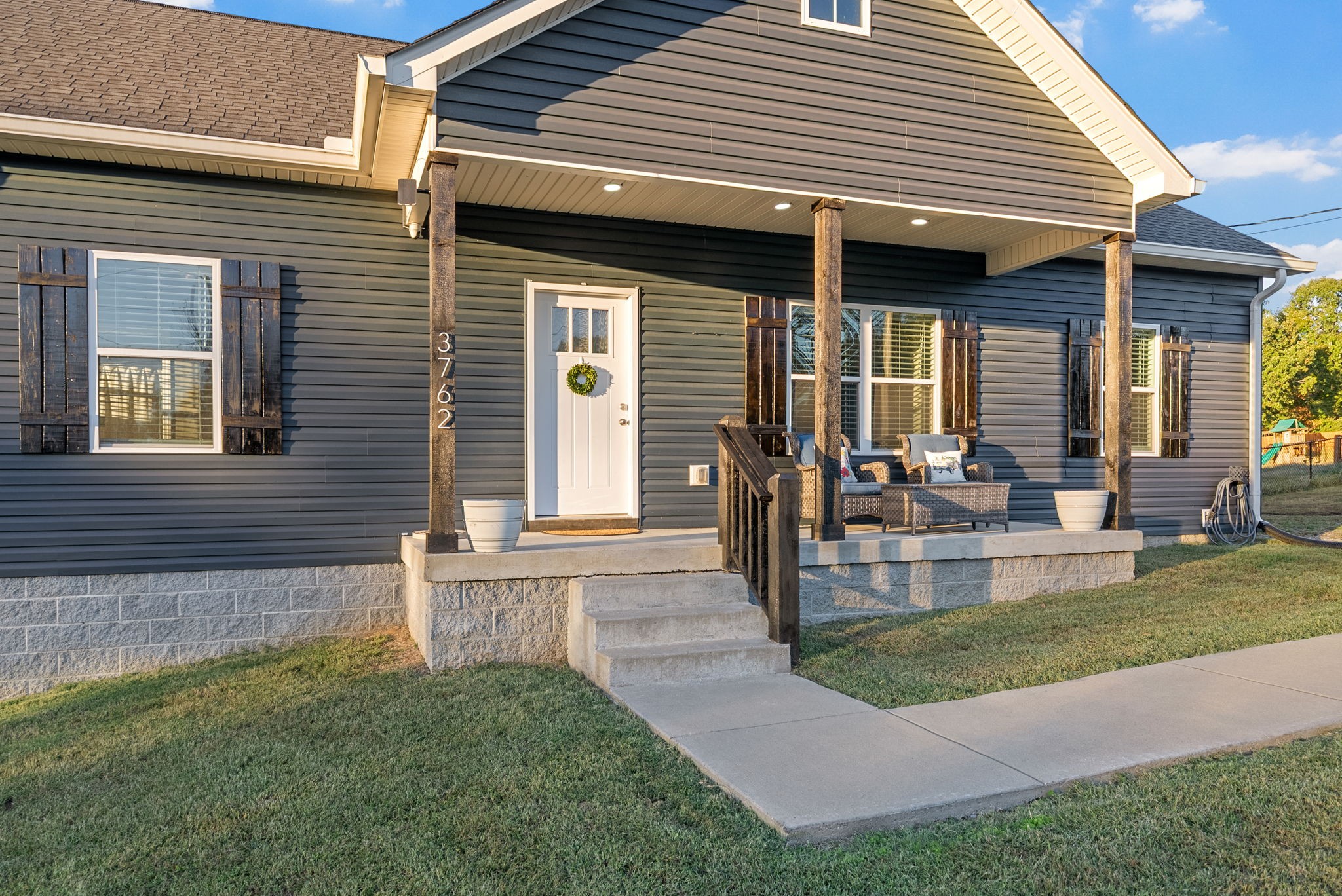 3762 Bowker Road Charlotte, TN 37036 - Photo 29 of 35 a view of a house with backyard and sitting area