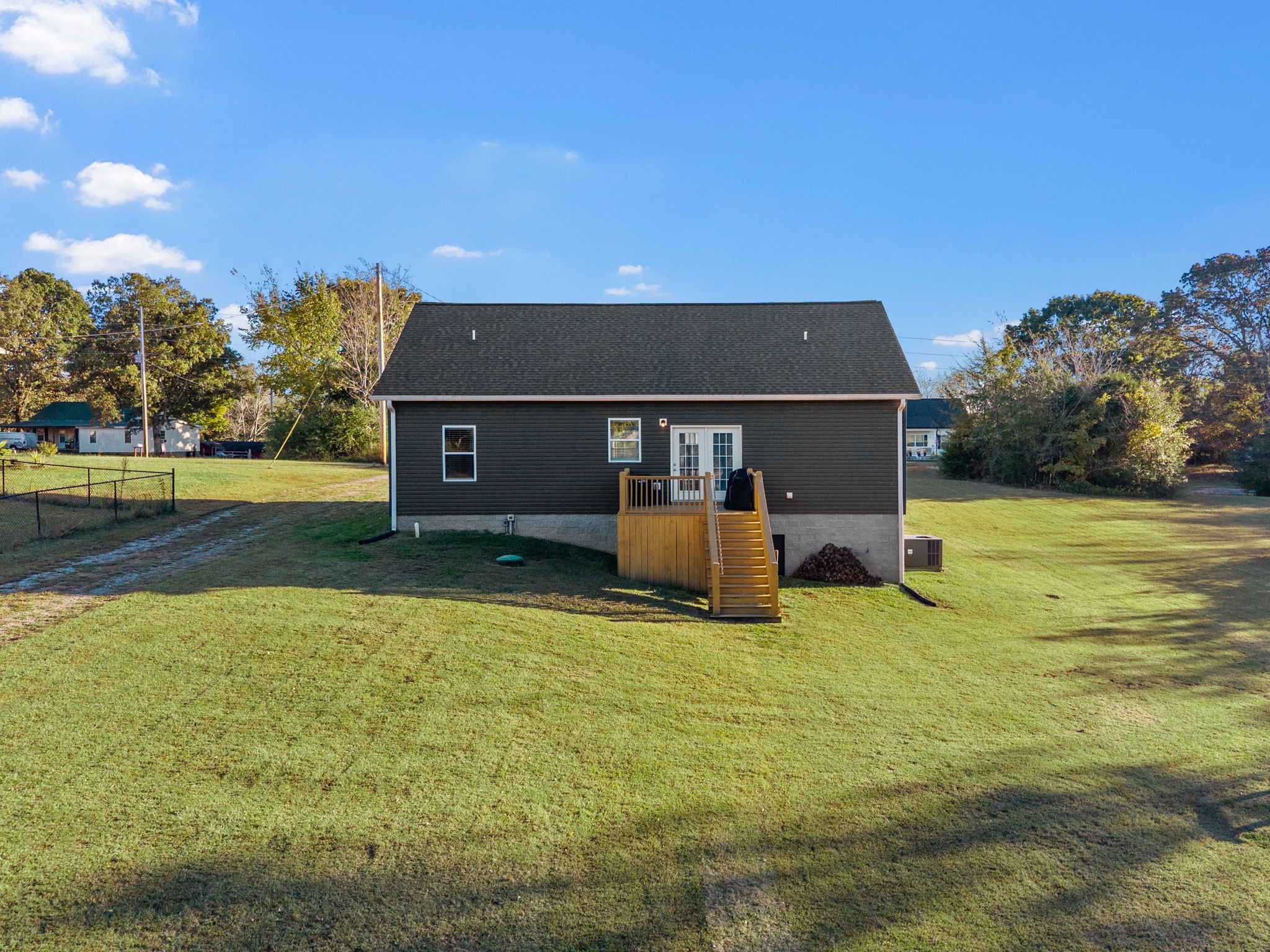 3762 Bowker Road Charlotte, TN 37036 - Photo 31 of 35 a front view of a house with a yard