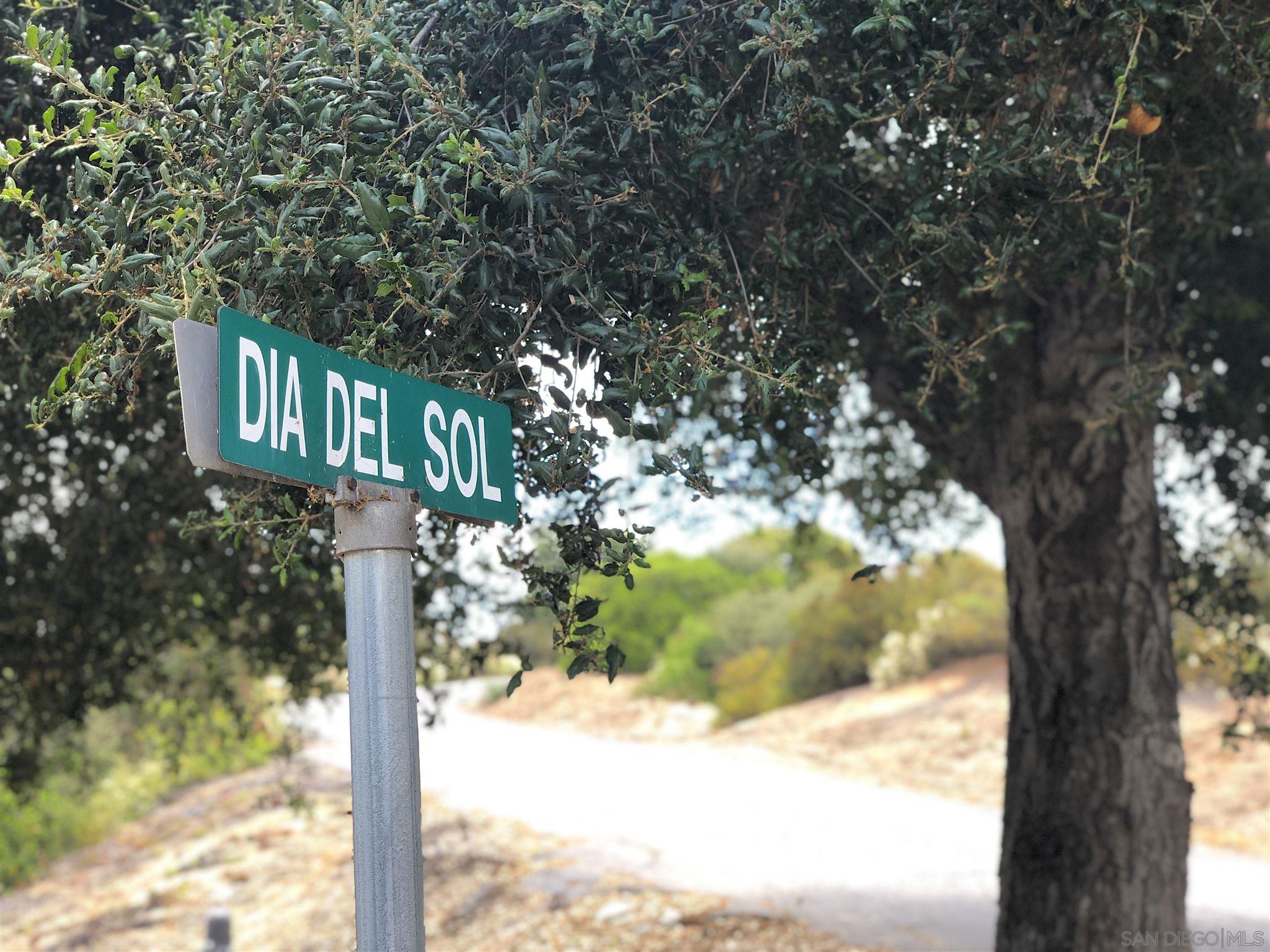 0 Sunset Road Valley Center, CA 92082 - Photo 19 of 20 a street sign on a pole next to a road