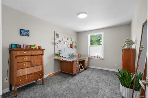 a room with furniture and window