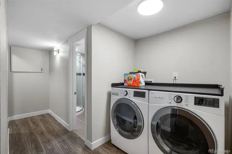 a view of storage and utility room with washer and dryer