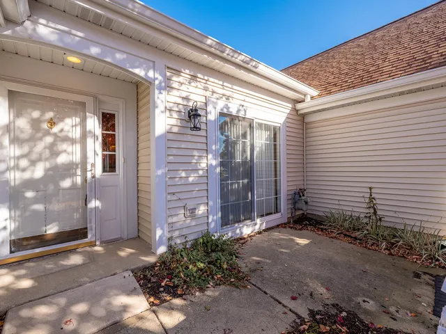 a view of a building with a yard