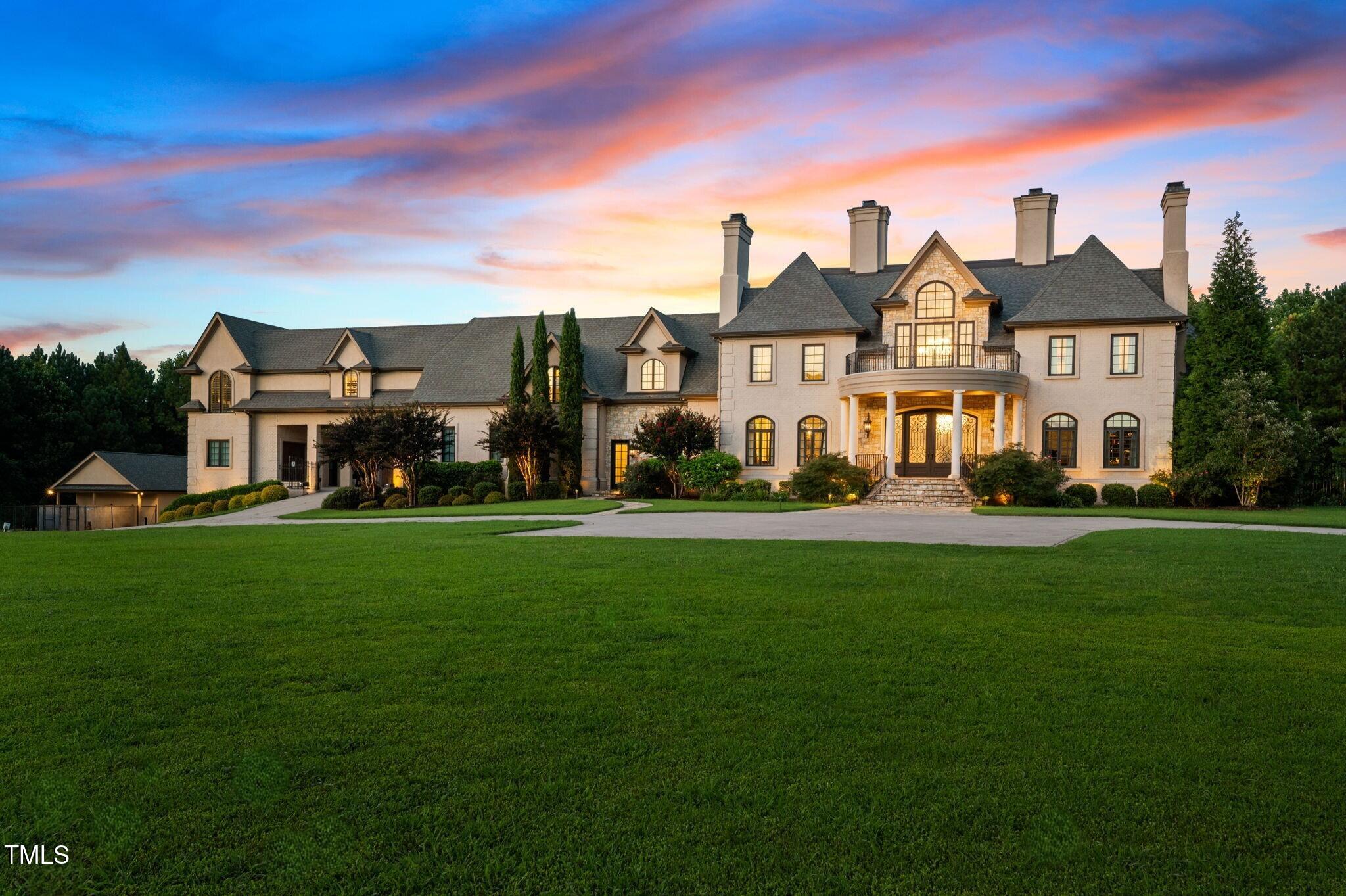 12660 Boyce Mill Road Raleigh, NC 27613 - Photo 3 of 89 a front view of a house with a yard