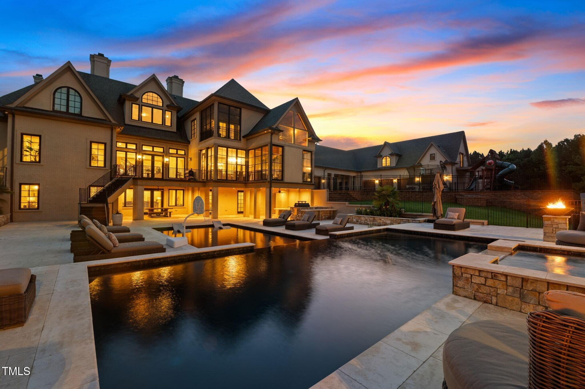 12660 Boyce Mill Road Raleigh, NC 27613 - Photo 4 of 89 a view of a swimming pool with seating space