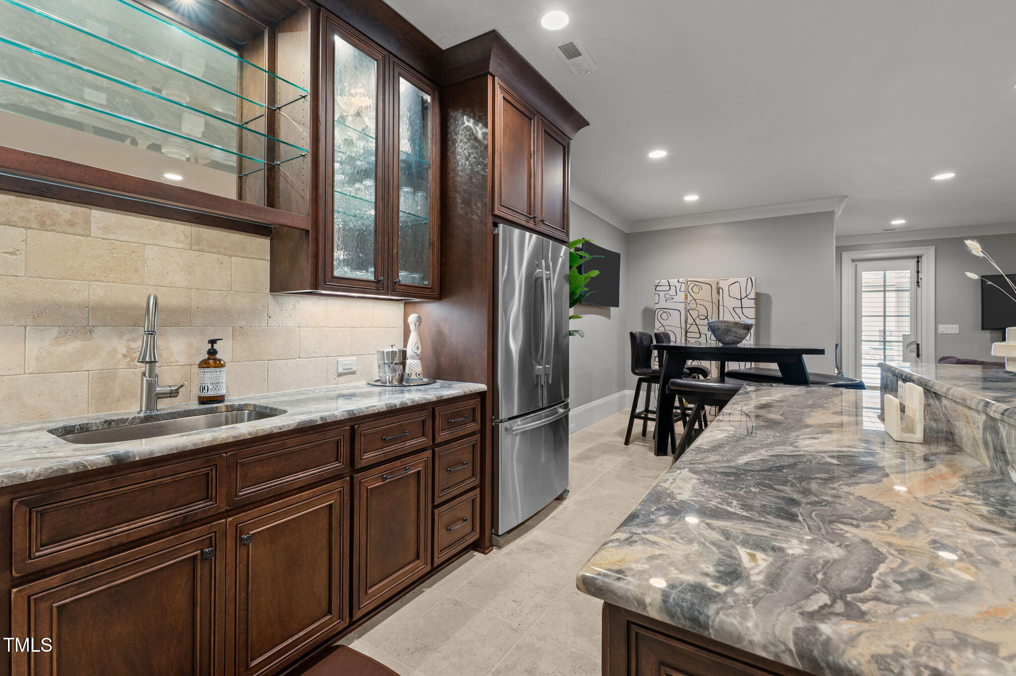 12660 Boyce Mill Road Raleigh, NC 27613 - Photo 54 of 89 a kitchen with stainless steel appliances granite countertop sink stove and cabinets