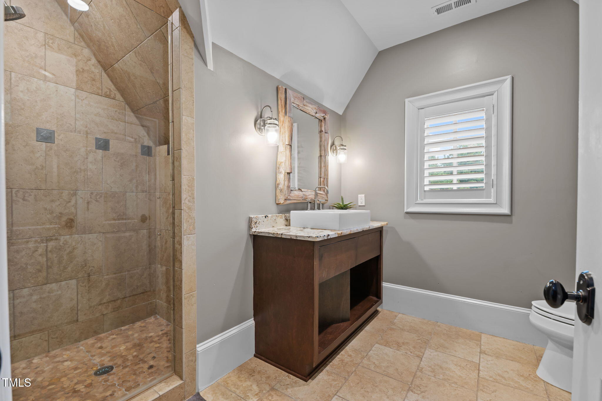 12660 Boyce Mill Road Raleigh, NC 27613 - Photo 61 of 89 a bathroom with a sink a toilet and shower