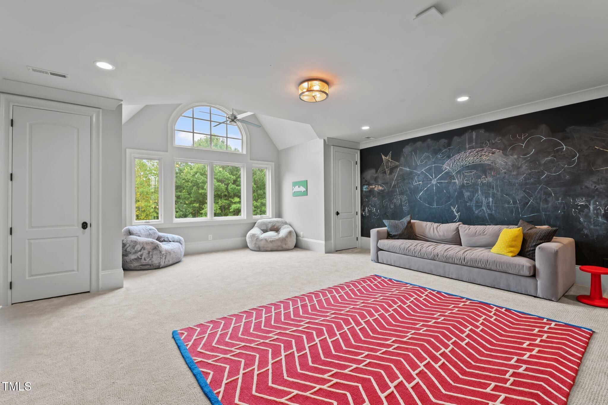 12660 Boyce Mill Road Raleigh, NC 27613 - Photo 62 of 89 a bedroom with a bed and a couch