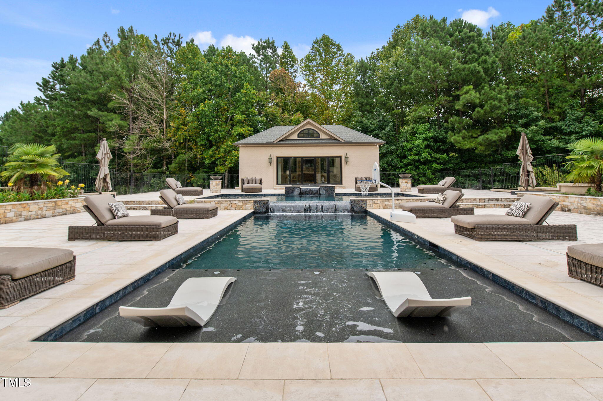 12660 Boyce Mill Road Raleigh, NC 27613 - Photo 72 of 89 a view of a patio with couches and a table and chairs with wooden fence