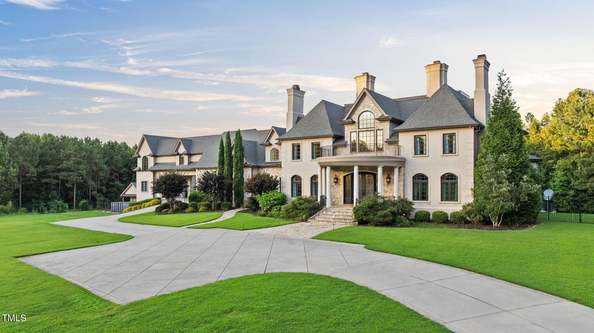 12660 Boyce Mill Road Raleigh, NC 27613 - Photo 85 of 89 a front view of house with yard and green space