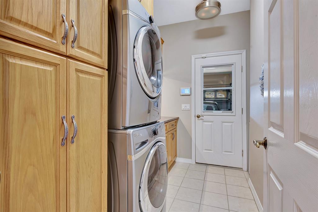 7344 Arrowhead Run Lakewood Ranch, FL 34202 - Photo 19 of 24 a utility room with dryer and washer
