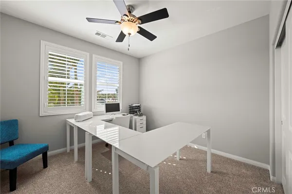 a view of a dining room and a window