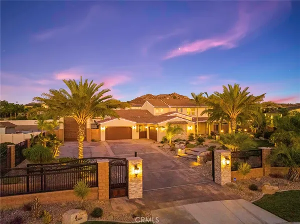 a view of multiple houses with a street