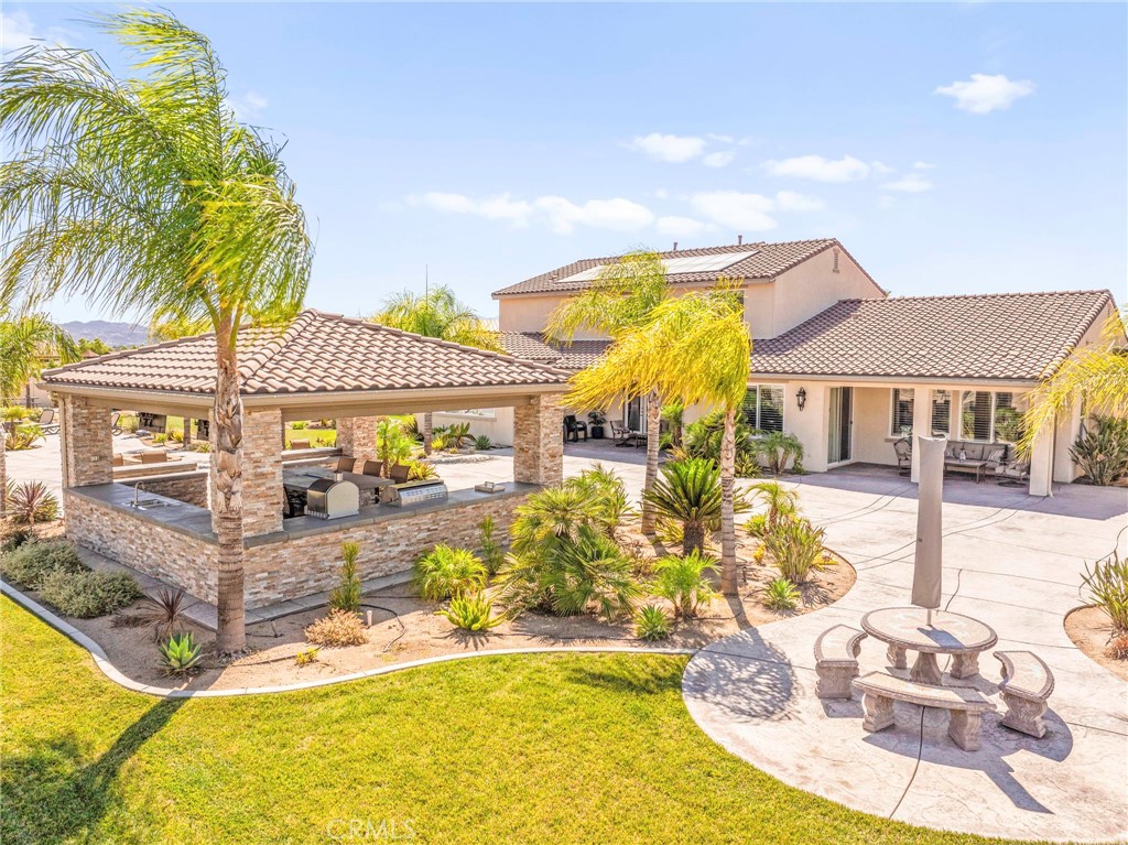 16555 Vía Los Caballeros Riverside, CA 92504 - Photo 42 of 51 a view of a house with swimming pool