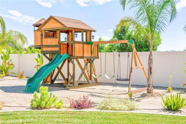 a view of a swimming pool with a patio