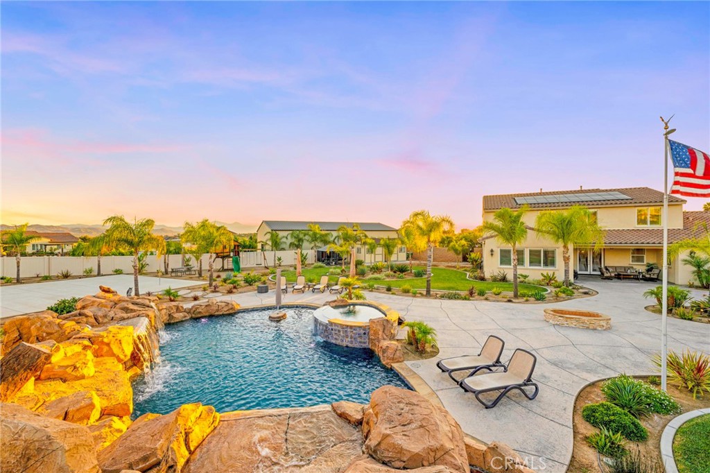 16555 Vía Los Caballeros Riverside, CA 92504 - Photo 47 of 51 a view of a lake with couches and city view