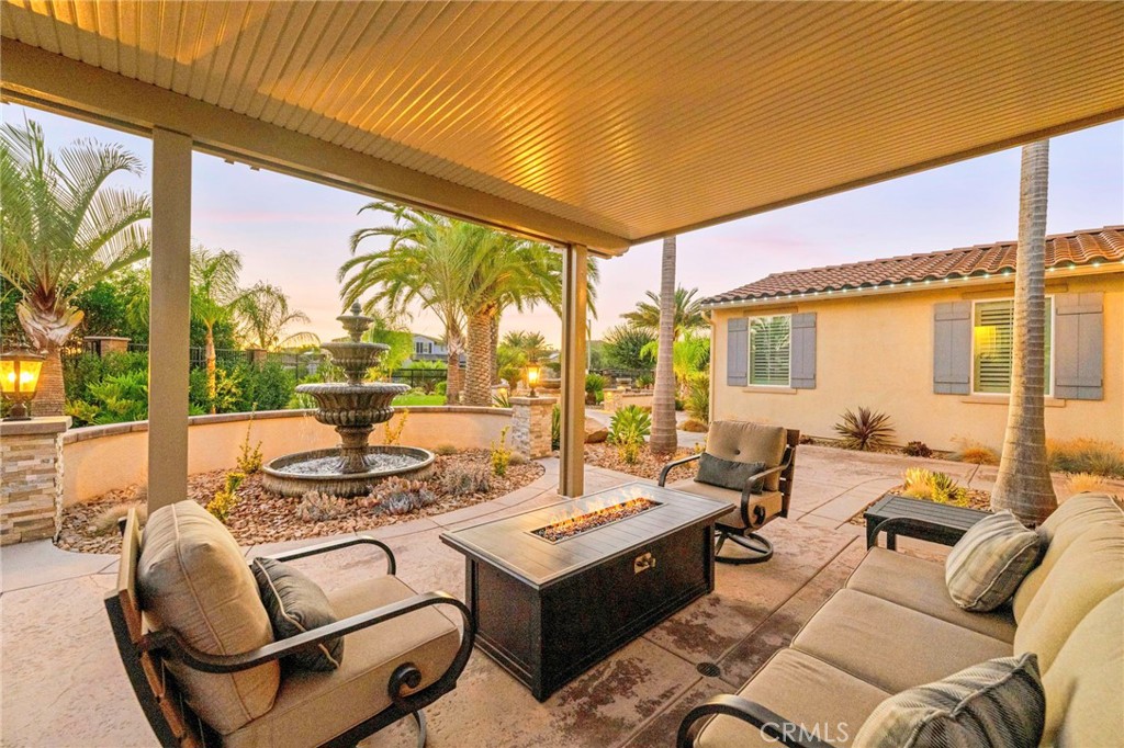 16555 Vía Los Caballeros Riverside, CA 92504 - Photo 8 of 51 a living room with furniture and a large window