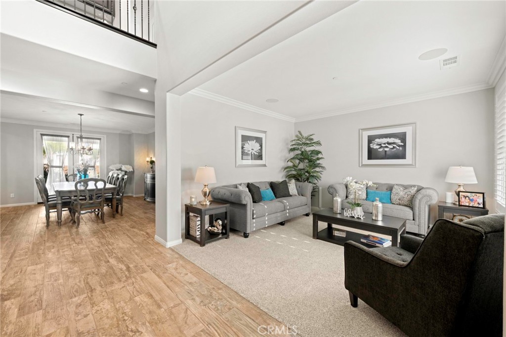 16555 Vía Los Caballeros Riverside, CA 92504 - Photo 9 of 51 a living room with furniture and a dining room