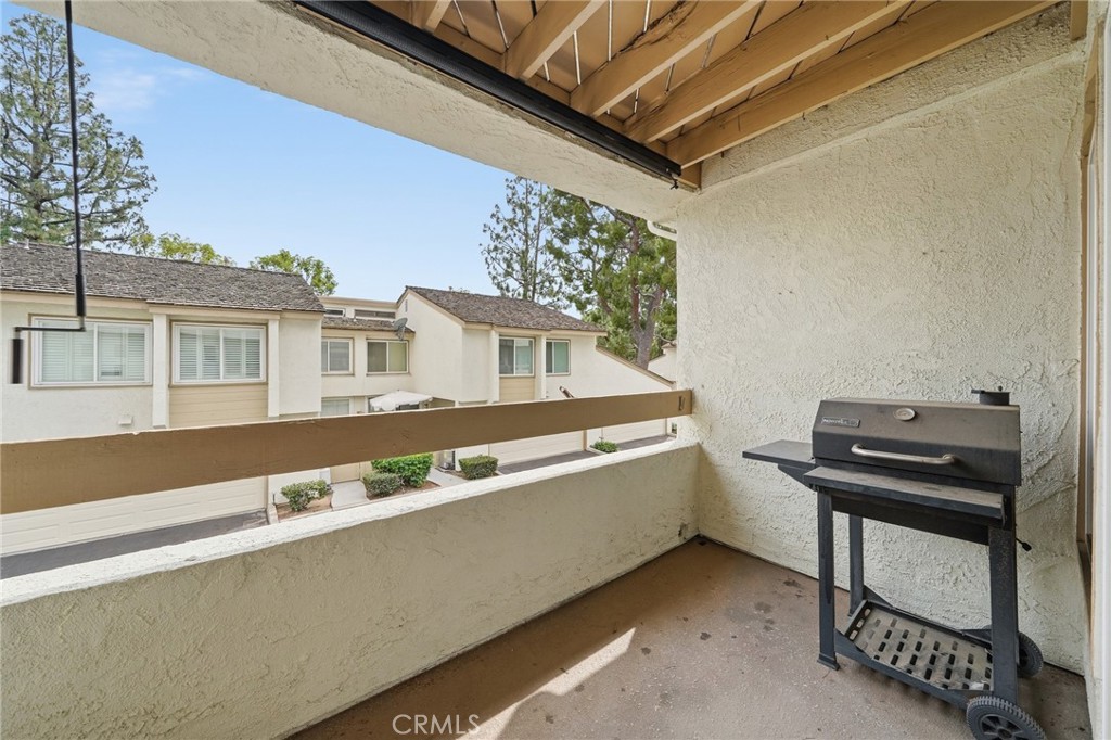 259 Scenic Way Brea, CA 92821 - Photo 19 of 62 a view of a balcony with two chairs and a window