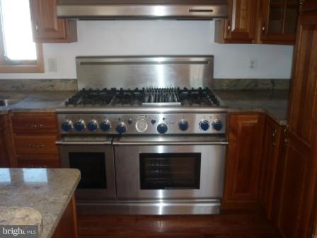 1302 Goose Neck Road Middle River, MD 21220 - Photo 22 of 29 a stove top oven sitting inside of a kitchen