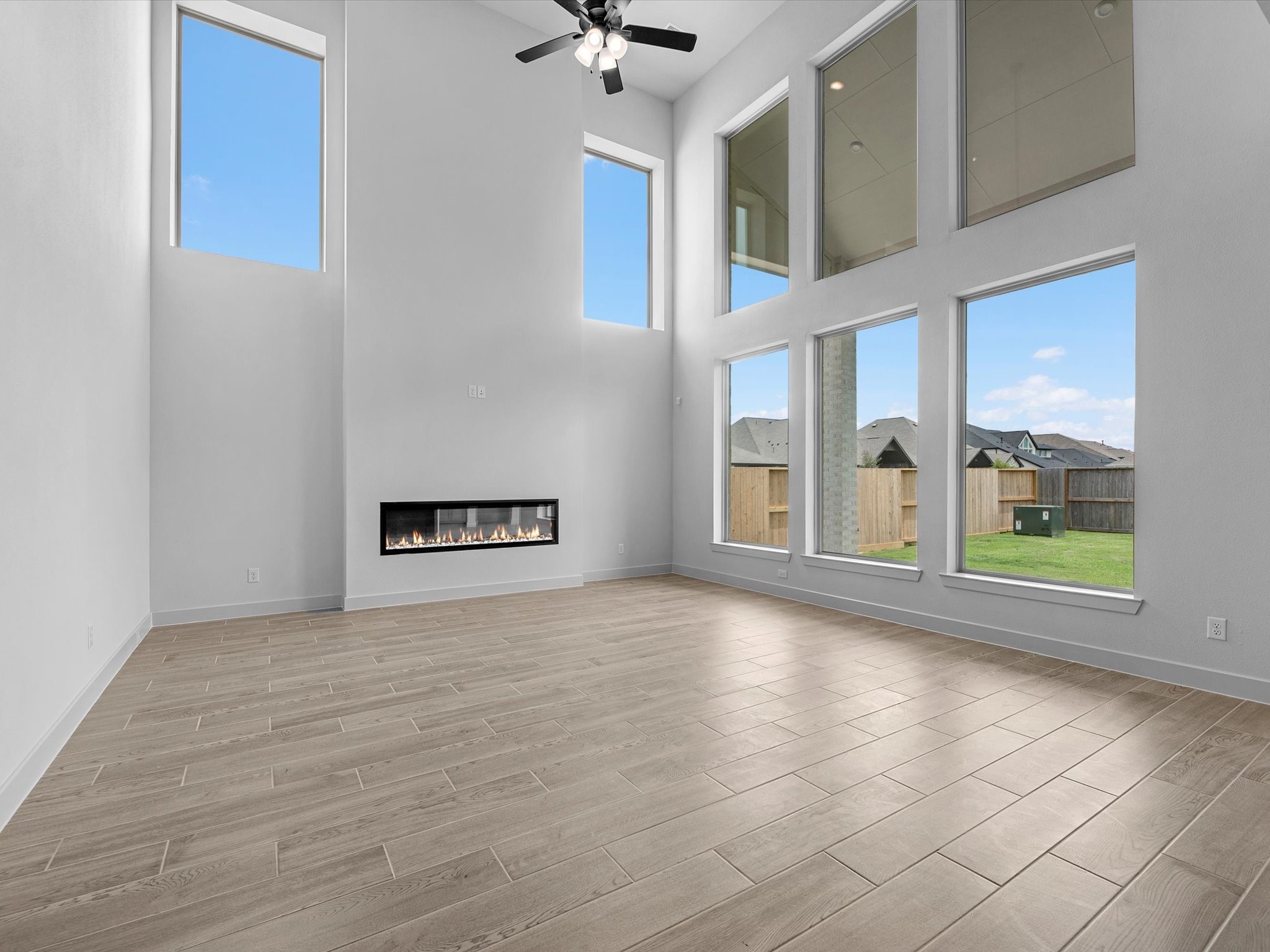 8915 Acropolis Lane Manvel, TX 77578 - Photo 6 of 32 a view of an empty room with a window