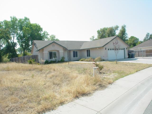 7764 Pit Road Redding, CA 96001 - Photo 1 of 8 a front view of house with yard