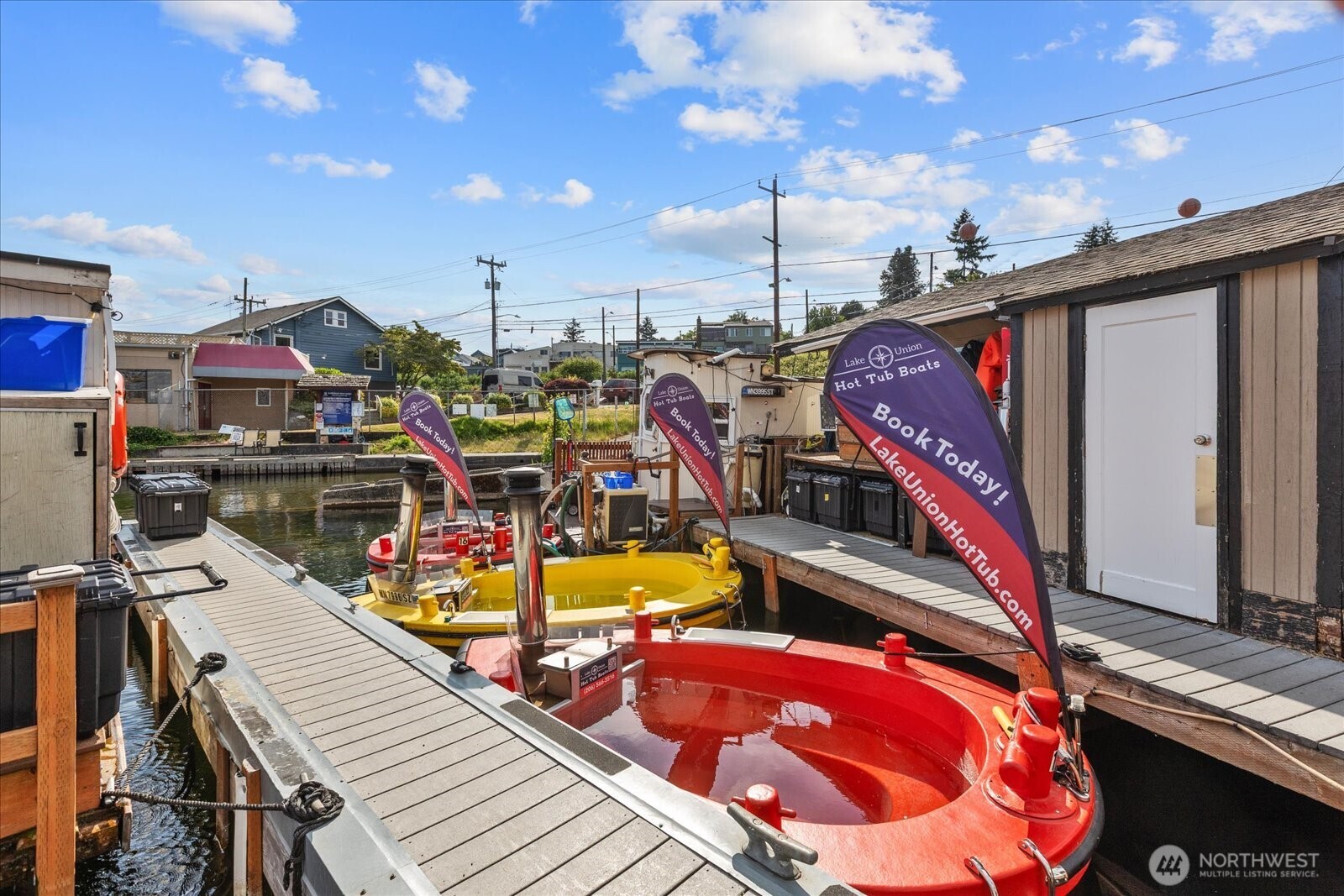 2401 North Northlake Way, Unit E7 Seattle, WA 98103 - Photo 19 of 23 a view of a balcony with chairs