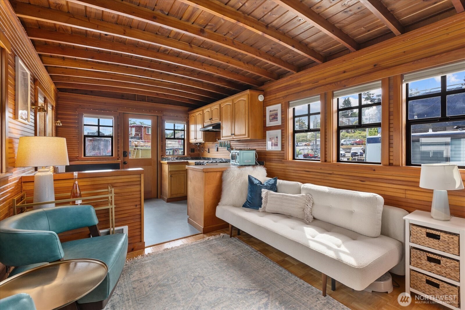 2401 North Northlake Way, Unit E7 Seattle, WA 98103 - Photo 6 of 23 a living room with furniture and a fireplace