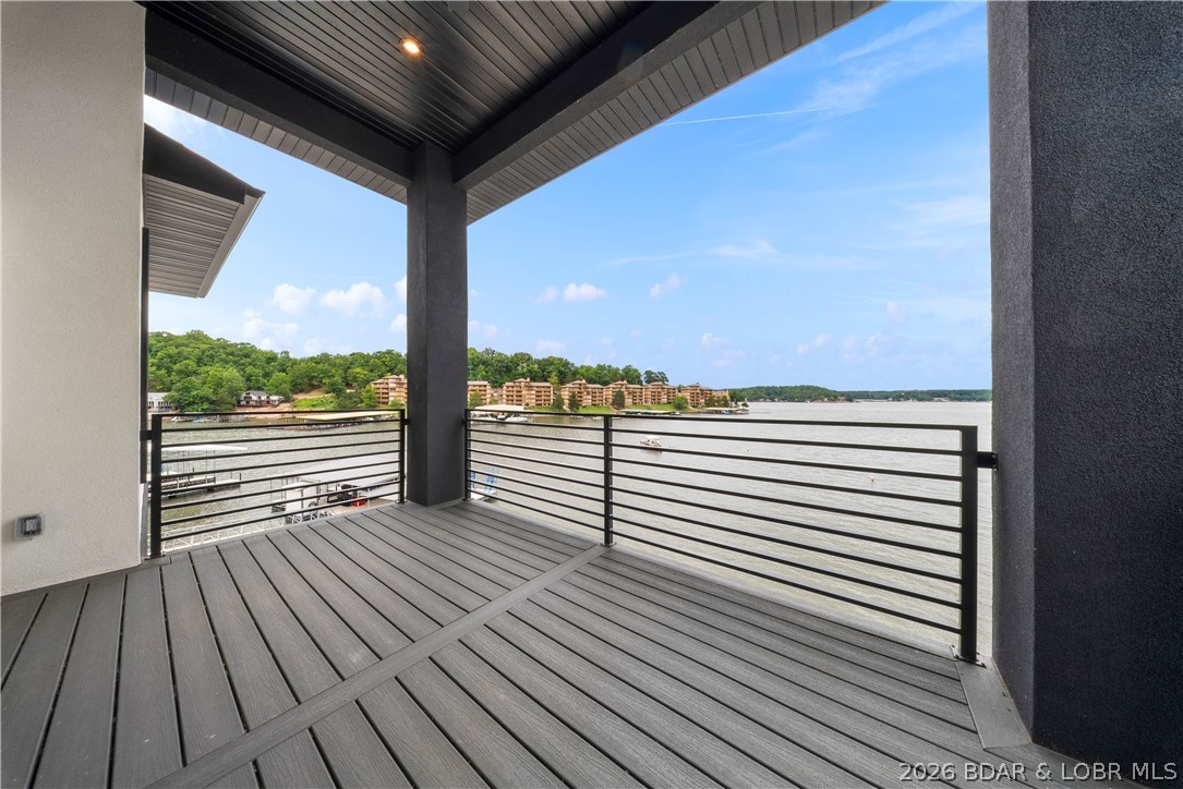 439 Red Bud Road Lake Ozark, MO 65049 - Photo 34 of 98 Covered composite deck providing the perfect setti
