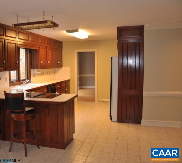 2355 Cinnamon Ridge Road Charlottesville, VA 22901 - Photo 20 of 36 a kitchen with a sink and a refrigerator
