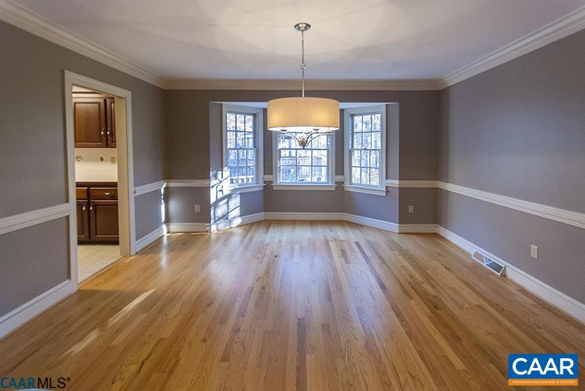 2355 Cinnamon Ridge Road Charlottesville, VA 22901 - Photo 5 of 36 wooden floor in an empty room with a window