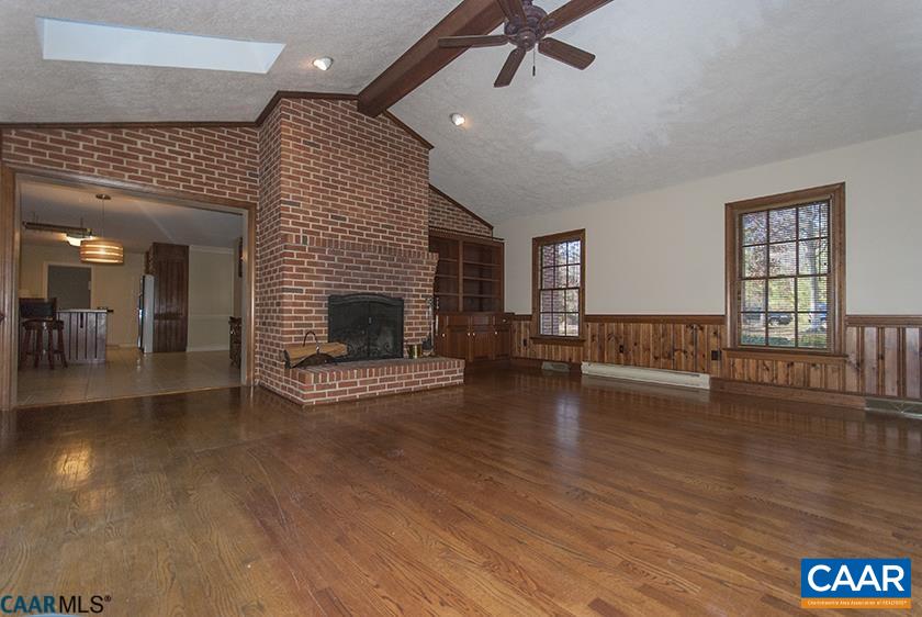 2355 Cinnamon Ridge Road Charlottesville, VA 22901 - Photo 8 of 36 a living room with furniture and a fireplace