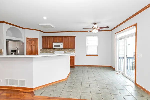 a view of a kitchen with a sink and a window