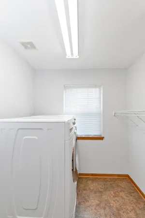 a view of walk in closet with window