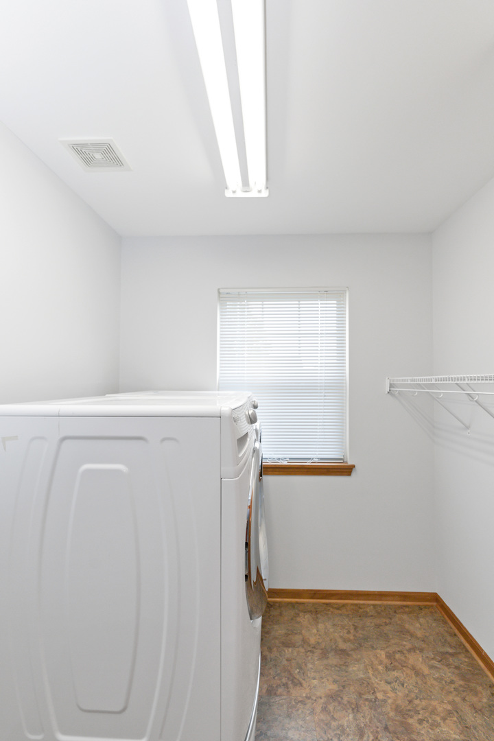 3311 Lafayette Street Elgin, IL 60124 - Photo 42 of 50 a view of walk in closet with window